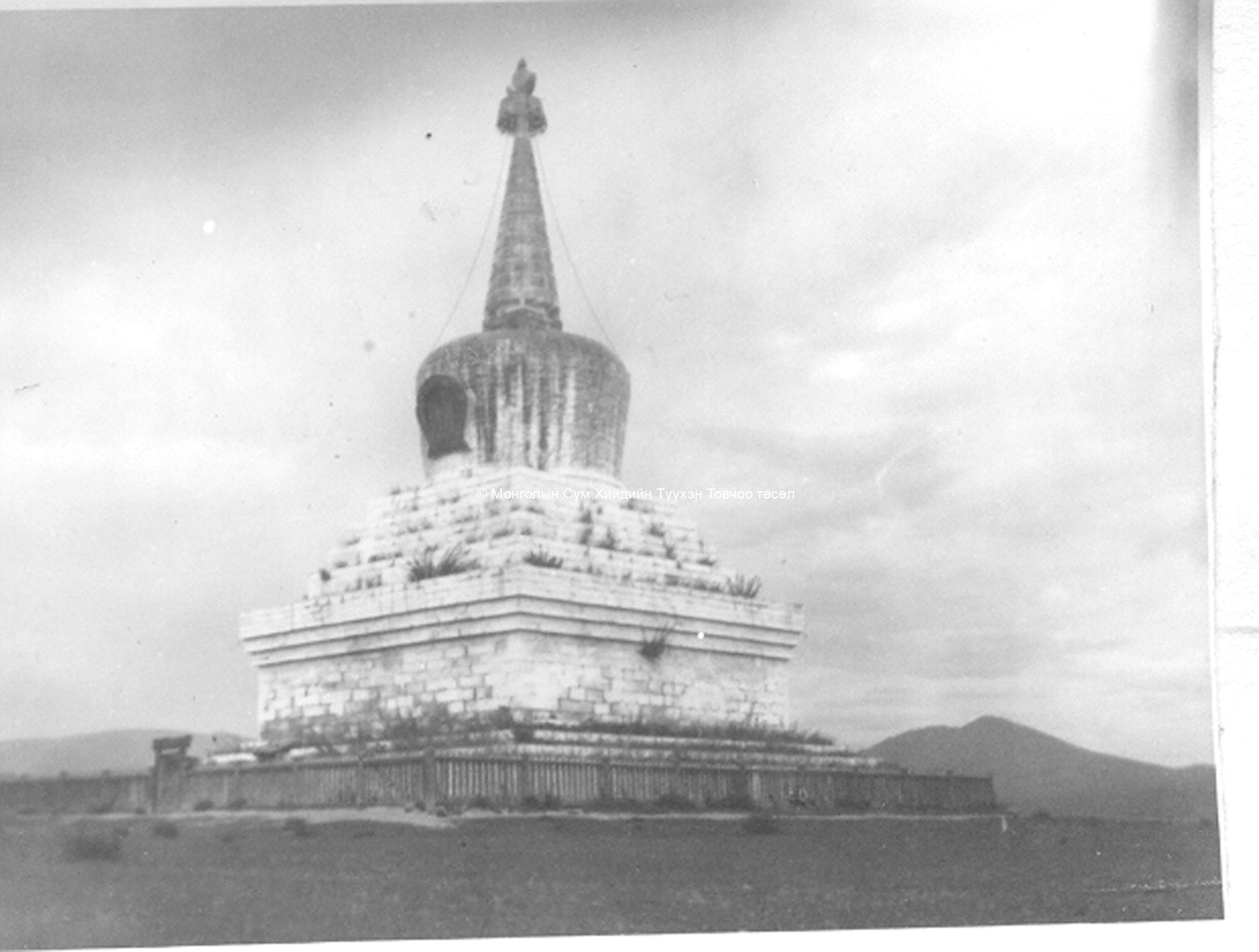 The 40 m high white stupa. Film Archives K-23758